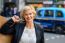 Cheerful Business Woman Holding Shopping Bag