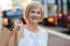 Trendy Woman Holding Shopping Bags