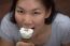 Young Woman Eating Ice Cream