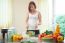 Happy Woman Cooking Vegetables Green Salad