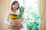 Young Woman With Vegetables In Shopping Bag