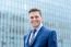 Businessman Standing Outside Modern Building