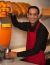 Cheerful Chef Making Fresh Orange Juice