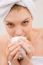 Woman In Spa Holding Cup Near Mouth