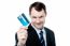 Cheerful Businessman Holding Credit Card