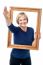 Excited Woman Holding Picture Frame