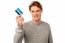 Smiling Young Man Holding Credit Card