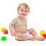 Cute Infant Boy With Toys