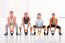 Multiethnic Group Of People Doing Kettlebell Crossfit Exercise