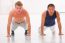 Two Young Man Doing Push-ups In Gym