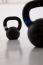 Two Black Iron Kettlebell For Weightlifting And Fitness