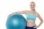 Young Smiling Woman With Fitball