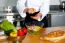 Male Chef Put Ingredient In The Glass Bowl