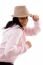 Side Pose Of Smiling Model Holding Hat On White Background