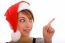 Front View Of Pointing Woman In Christmas Hat