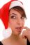 Front View Of Thinking Woman In Christmas Hat