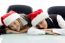 Young Colleagues Wearing Christmas Hat