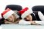 Young Corporate Wearing Christmas Hat And Sleeping