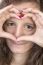 Teen With Hands In Heart Shape