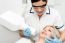 Female Dentist Using X-ray Machine