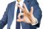 Businessman With Ok Sign Hand Gesture Isolated