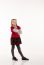 Little Girl In Red Dress Posing Standing In Studio