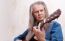 Middle-aged Man Playing Guitar Closeup