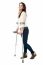 Full Length Portrait Of Young Girl Walking With Crutches