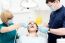 Dentist Cleaning A Woman Teeth