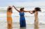 Portrait Of Young Asian Woman With Happiness Emotion Wearing Beautiful Dress Dancing On Sea Beach And Laughing Joyful Use For People Relaxing Vacation On Destination