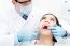 Male Dentist Treat A Woman Patient