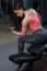 Sporty Woman Exercising With Weights In Her Gym