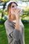 Portrait Of Beautiful Girl Drinking Water Glass At Green Park