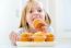 Beautiful Child Having Breakfast At Home