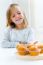 Beautiful Child Having Breakfast At Home