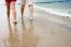 Mother And Daughter Are On The Beach