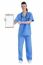 Full Length Of Young Nurse Pointing Blank Clipboard