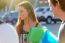 A Group Of Friends Talking In The Street After Class