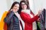 Two Beautiful Girls Shopping In A Clothes Shop