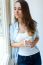 Beautiful Woman Drinking Coffee In The Morning Near The Window