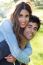 Outdoor Portrait Of Young Caucasian Couple At The Park