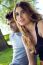 Outdoor Portrait Of Young Caucasian Couple At The Park