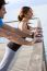 Couple Doing Push Ups Near The Sea