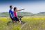 Happy Young  Couple On A Bike Ride In The Countryside