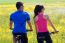 Happy Young  Couple On A Bike Ride In The Countryside