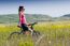 Fit Woman Riding Mountain Bike