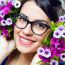 Happy Young Girl With Flowers