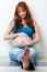 Beautiful Pregnant Woman Relaxing At Home