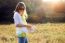 Beautiful Young Woman Enjoying Summer In A Field