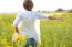 Beautiful Young Woman Enjoying Summer In A Field